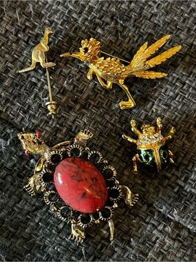Curated Vtg Animal Brooch Set with Red Stone Accent in Gold Tone